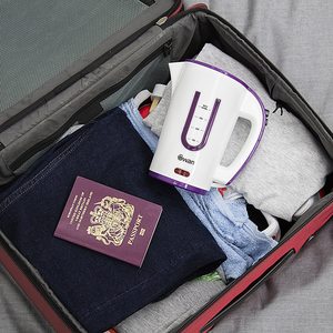 The Swan Travel Kettle in a suitcase.